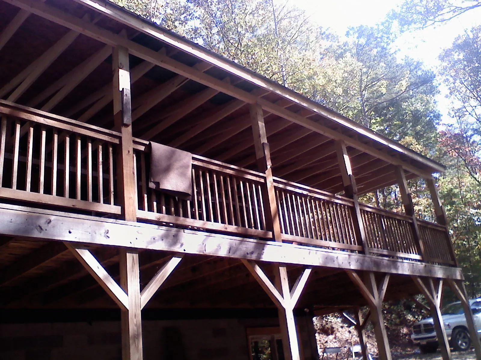 Timber framing under a new elevated porch and deck — Roof Leak Repair in Black River by Roofing Brothers